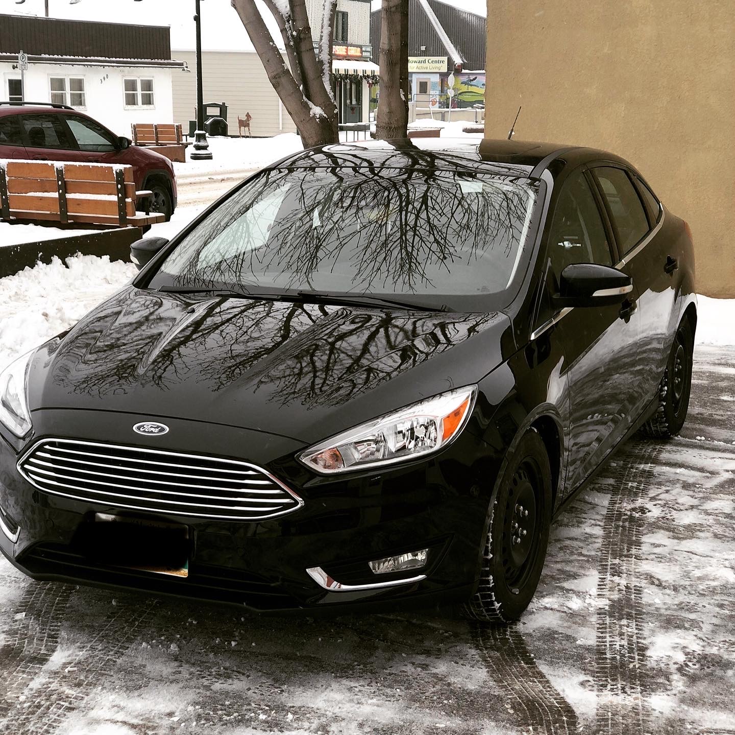 The same Ford Focus after collision repair and refinishing